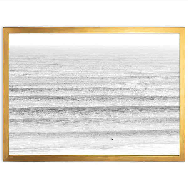 a picture frame with a picture of the ocean