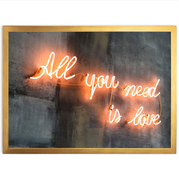 a neon sign that says all you need is love