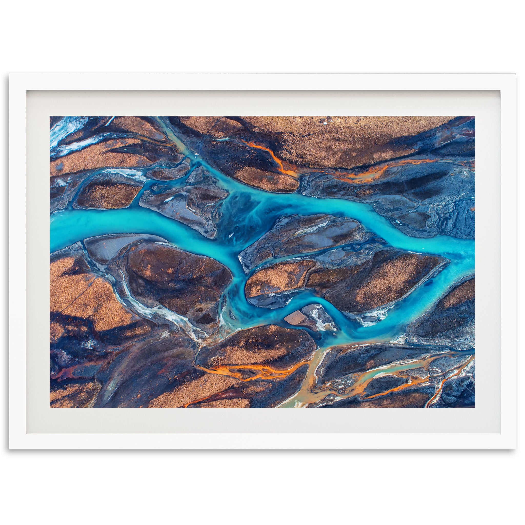 an aerial view of a river flowing through land