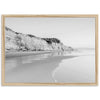 a black and white photo of a beach