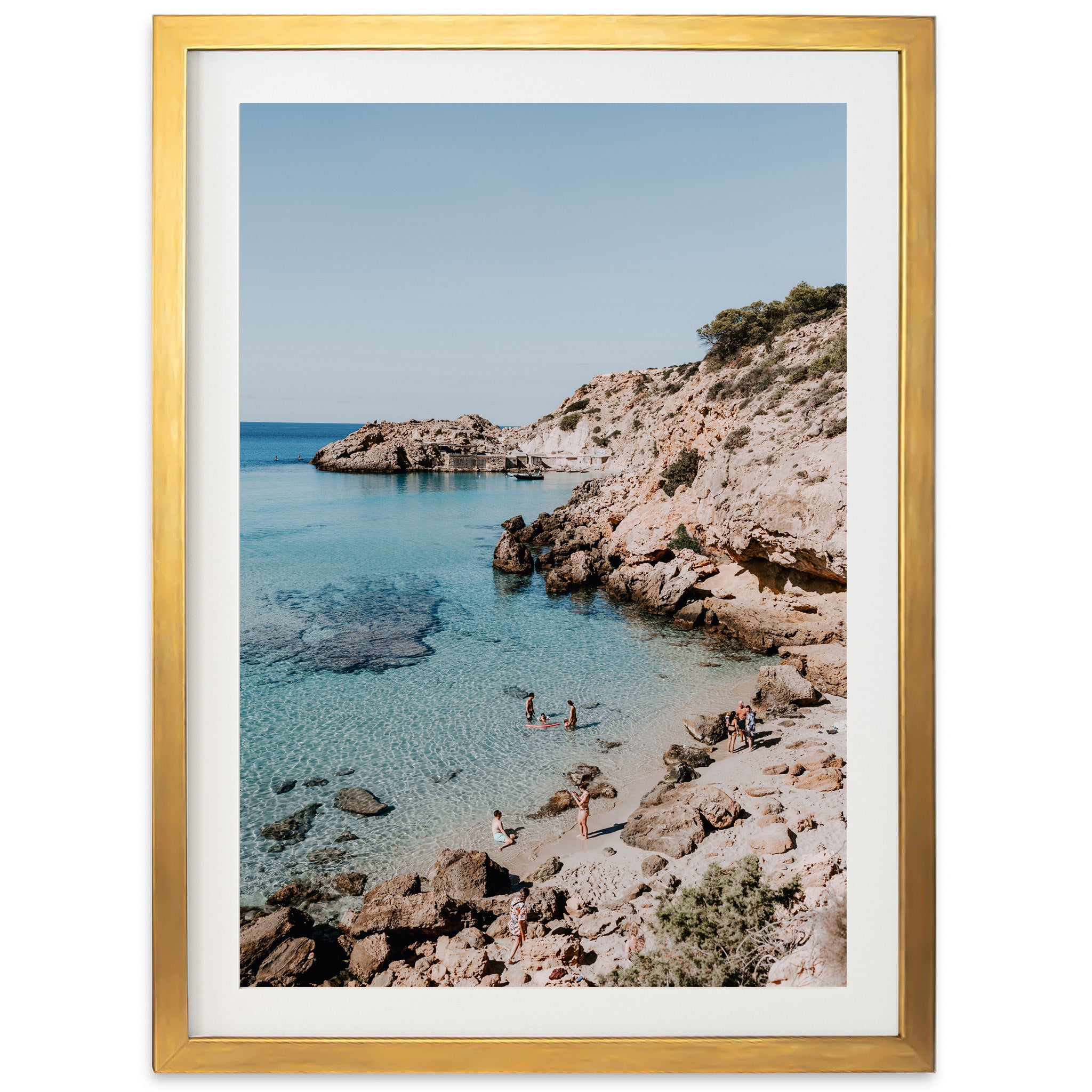 a picture of a beach with people swimming in the water