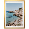 a picture of a beach with people swimming in the water