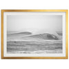 a black and white photo of a wave in the ocean